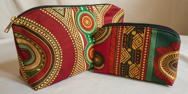 Afrocentric cosmetic bag set with red, green, and gold patterns.