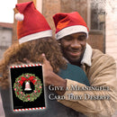 Two people hugging with a Christmas card featuring a wreath and text overlay.
