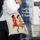 Close-up of a person carrying the Woman with God Canvas Bag showing its lightweight and stylish design
